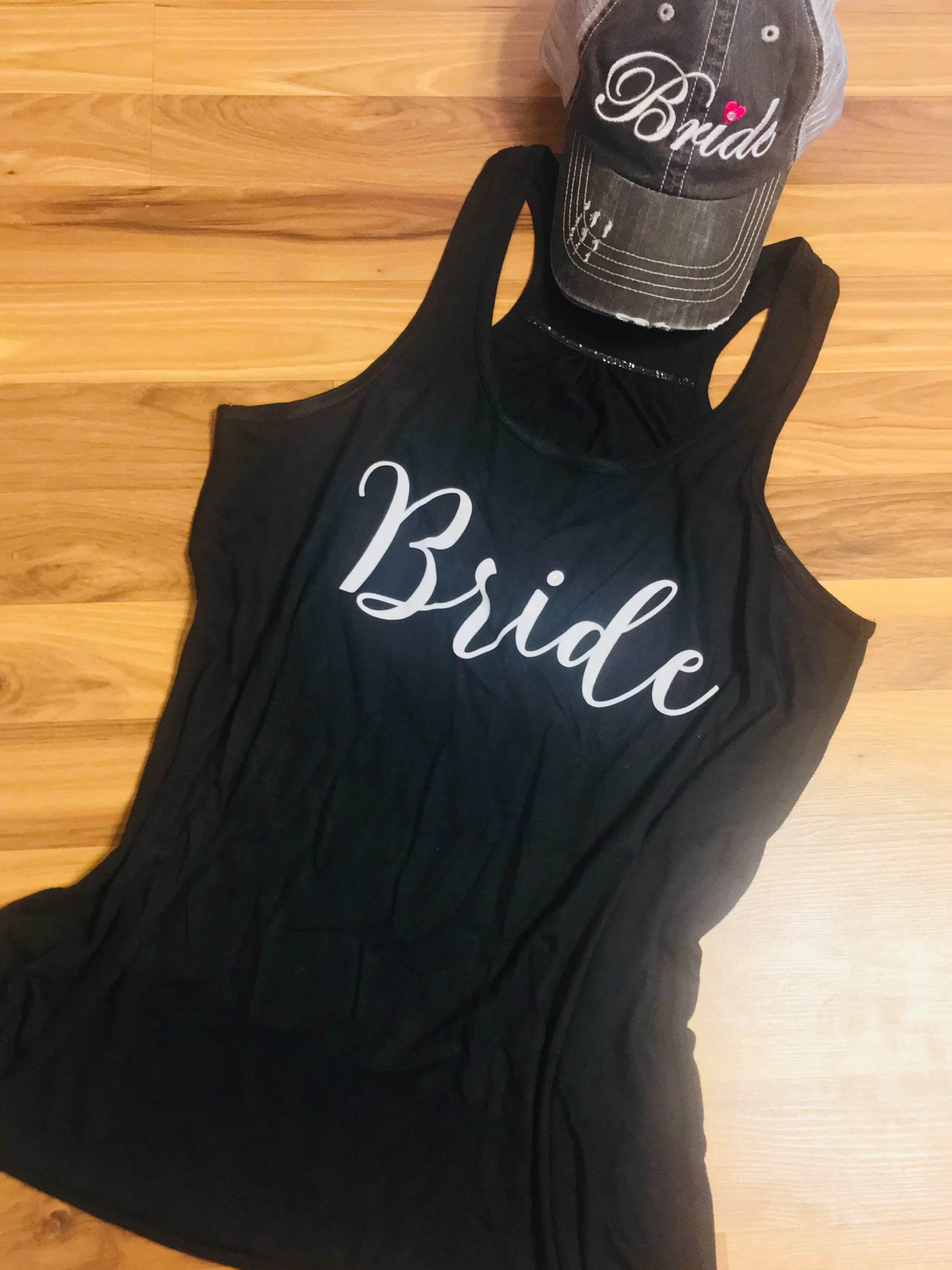 Hats and tanks { Bride } 1 gray hat $12 clearance. 1 black XL tank $15 clearance.